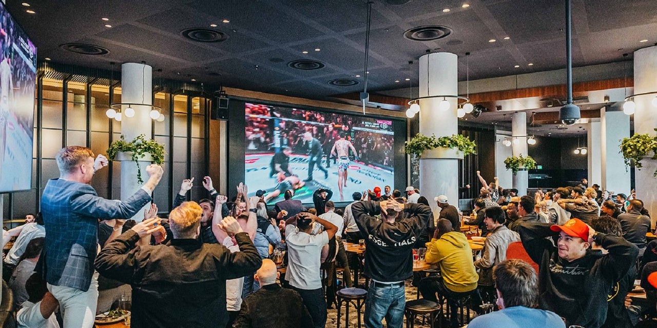 Fans watching the action on big screens